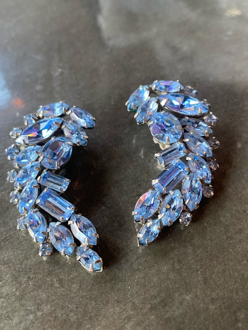 Vintage large blue rhinestone, dramatic curved clip on earrings mid-century